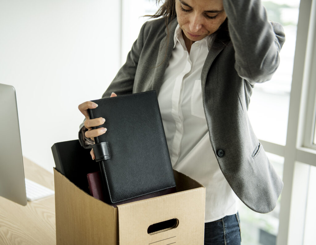 woman packing up her office items