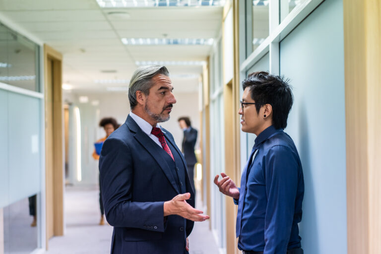 two people having a discussion